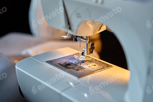 Preview: Close-up of sewing machine needle and presser foot