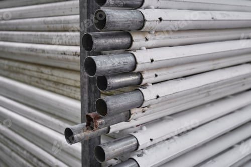 Preview: Closeup of old and rusty pipes stacked on top of each other