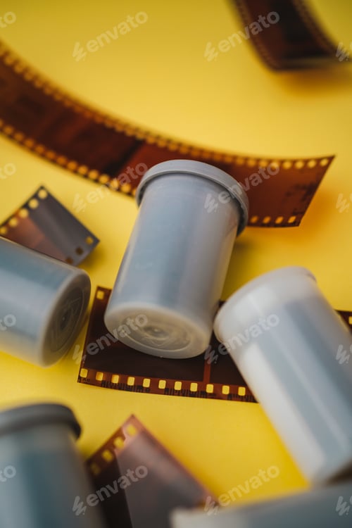 Preview: Film canisters yellow background