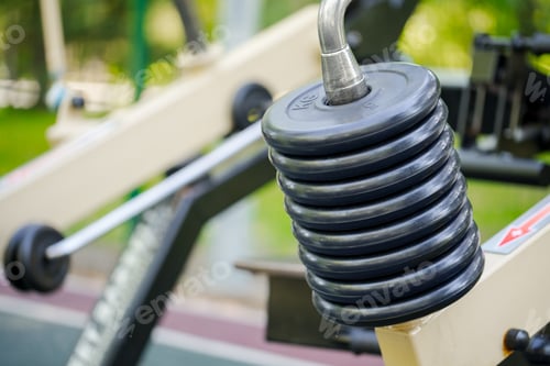 Preview: Outdoor fitness gym equipment in public park close up