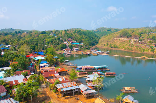 Preview: Aerial top view of houses in Mon village, Kanchanaburi, Thailand in urban city town in Asia
