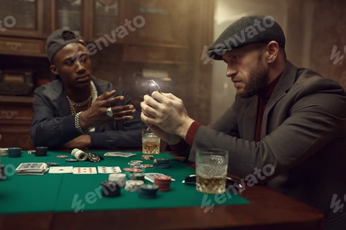 Preview: Poker player puts his wristwatch on the bank