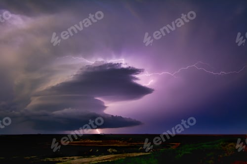 Preview: Lightning sparks from a spinning supercell thunderstorm at night near Leoti, Kansas