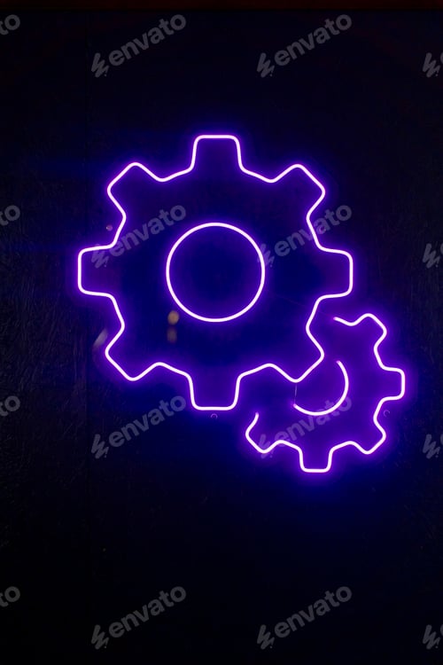 Preview: close-up At service station neon sign in the shape of a gear for oil hangs on the wall purple light