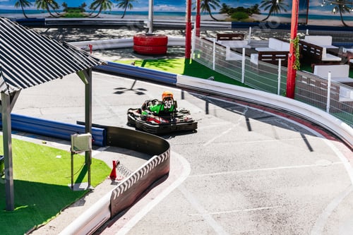 Preview: Go kart racing on outdoor track enjoying motorsports hobby