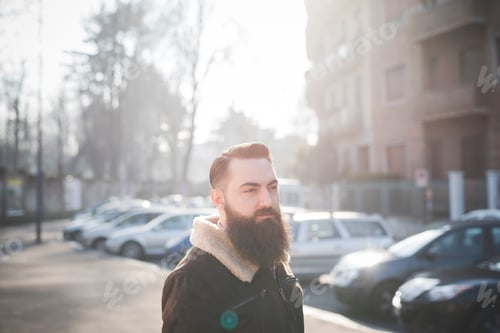 Preview: Young bearded man on street