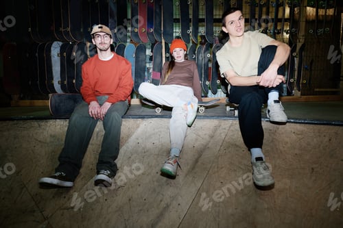 Preview: Three Friends Sitting In Skatepark