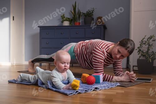 Preview: Mother Exercising at Home with Baby Nearby