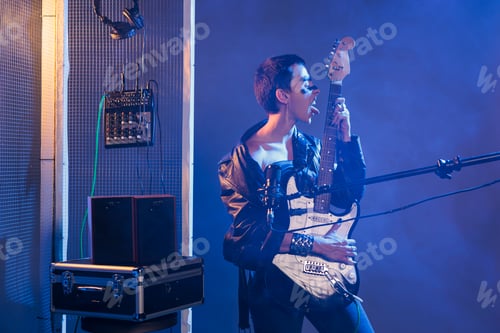 Preview: Mad rock artist sticking tongue out in studio