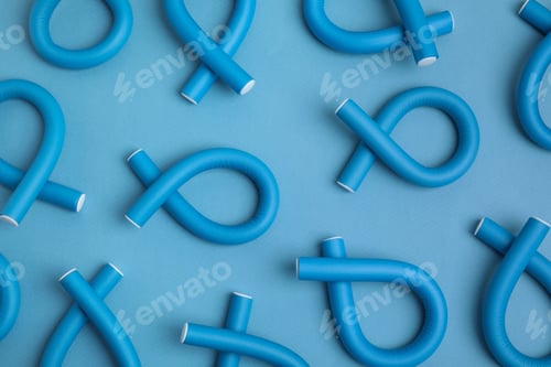 Preview: Curling rods on light blue background, flat lay. Hair styling tool