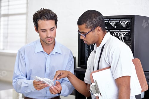 Preview: I will take this wire. Two men looking at a wire for the computer.