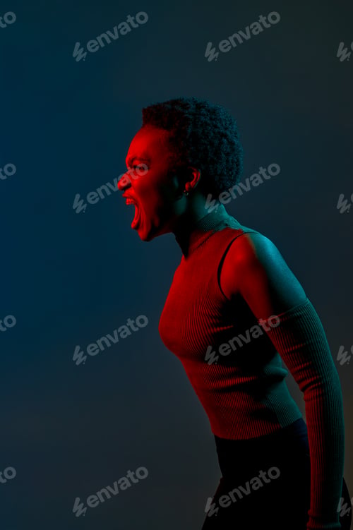Preview: Headshot portrait of young woman shouting