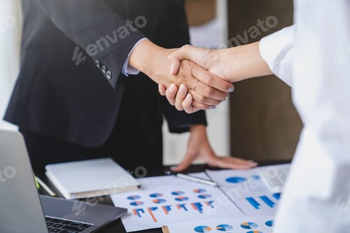 Preview: handshake of business People deals with business. Hold hands and shake hands in the office meeting t