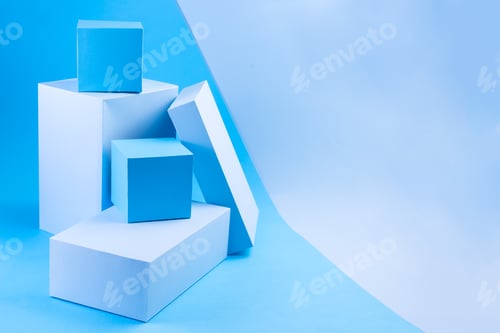 Preview: Light and dark blue geometric podiums on blue background, horizontal, copy space
