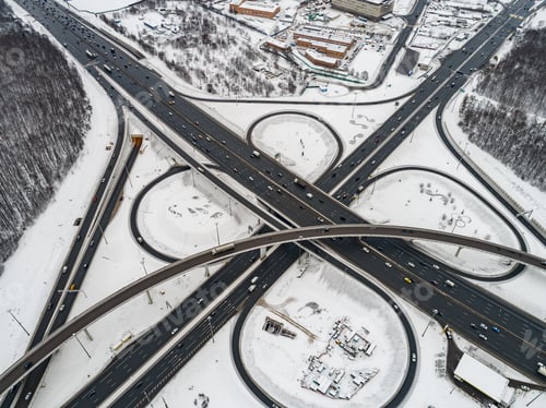 Preview: Aerial view of a freeway intersection Snow-covered in winter.