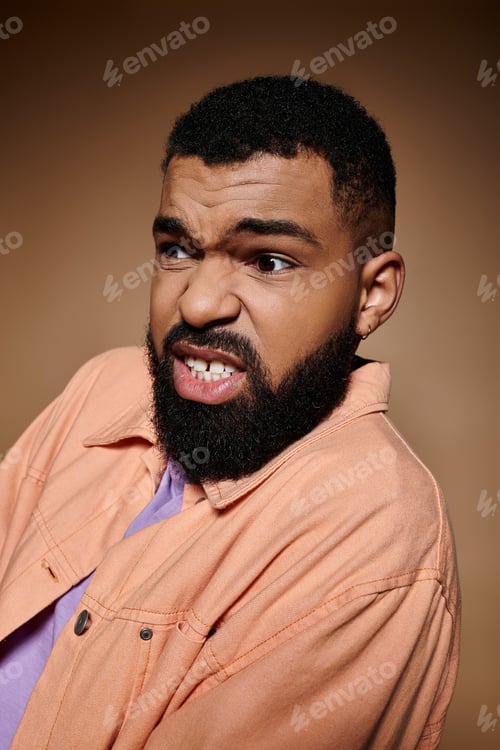 Preview: Stylish African American Man in Pink Shirt