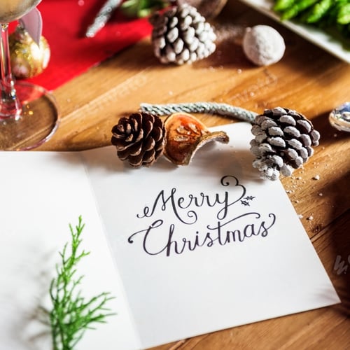 Preview: Merry christmas word card on wooden table holiday celebration