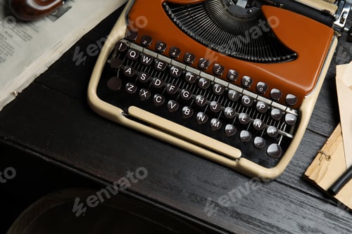 Preview: Typewriter on dark wooden table, closeup. Detective's workplace