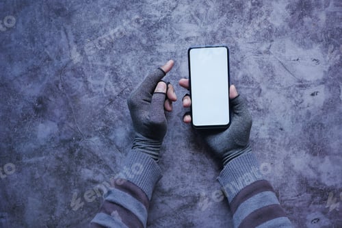 Preview: hacker hand stealing data from smart phone