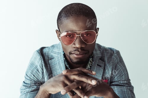 Preview: Portrait of handsome african american man in stylish clothes and sunglasses, looking at camera,