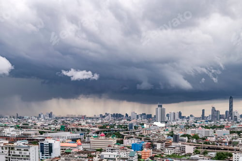 Preview: A heavy storm with rain and dramatic atmosphere clouds can be a sight to behold over a city center.
