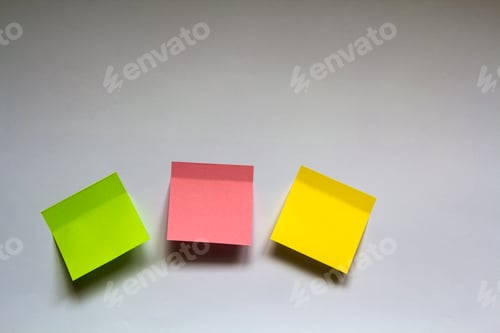 Preview: Blank colorful sticky notes isolated on white wall background