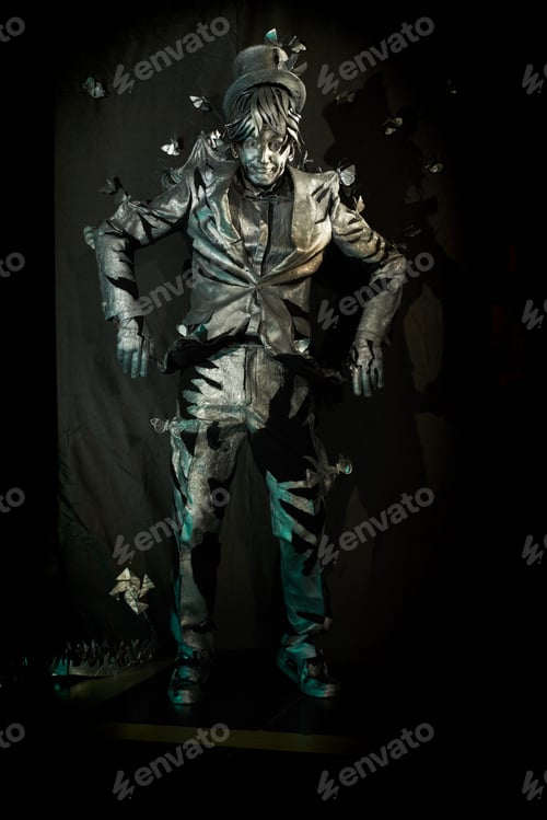 Preview: Portrait of mime artist with unnatural buttherflies around