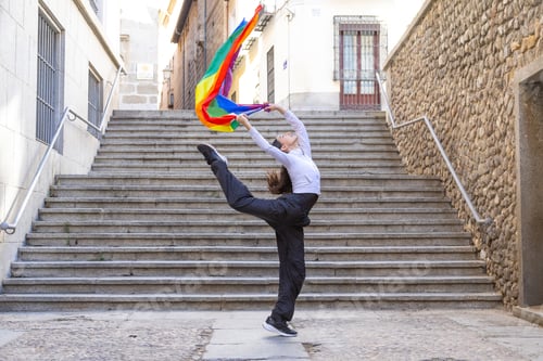 Preview: Dancer performing expressive movement with pride flag