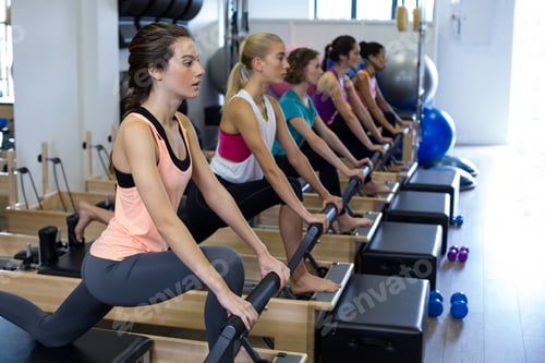 Preview: Group of women exercising on reformer