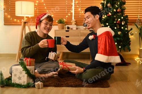 Preview: Two Young Men Celebrating Christmas Indoors Together