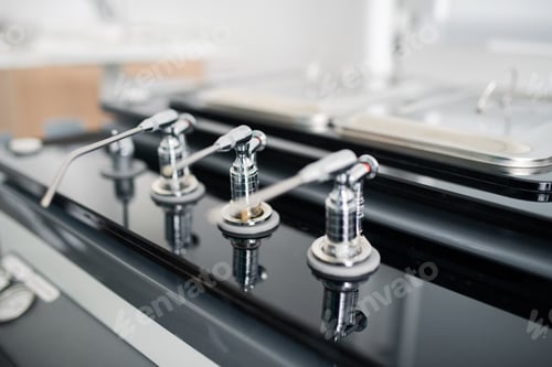 Preview: Row of modern equipment for dental healthcare and treatment