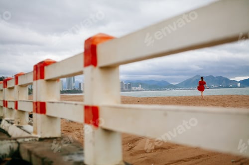 Preview: woman walk on beach alone
