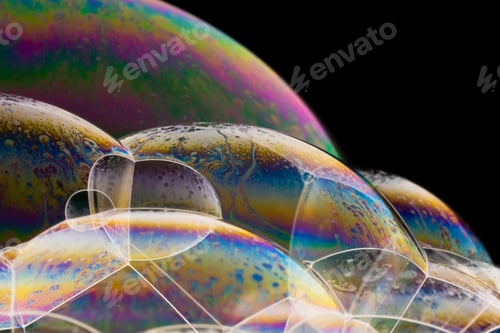 Preview: Macro shot of colorful soap bubbles on a dark background