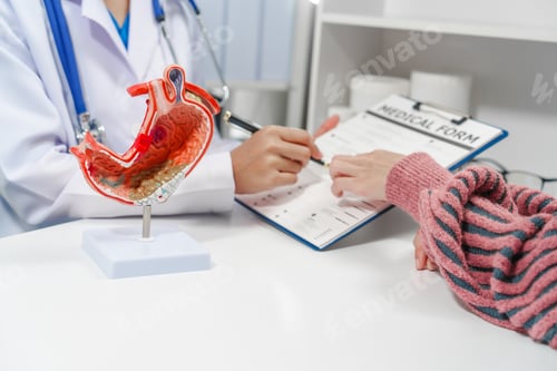 Preview: female medical professional a stethoscope is holding a clipboard, possibly discussing gastritis
