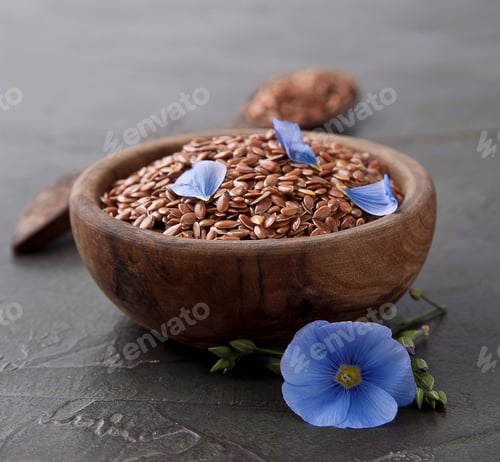 Preview: Flax seed on wooden plate