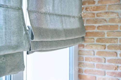 Preview: Close-up of roman blinds with gray linen fabric