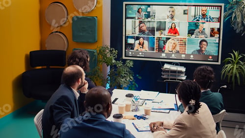 Preview: Executive board members attending videocall conference with shareholders