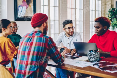 Preview: Male and female bloggers discussing content text for laptop promotion
