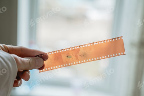 Preview: holding old film