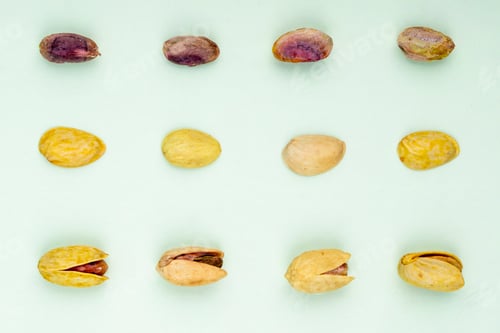 Preview: top view of pistachio nuts isolated on a white background