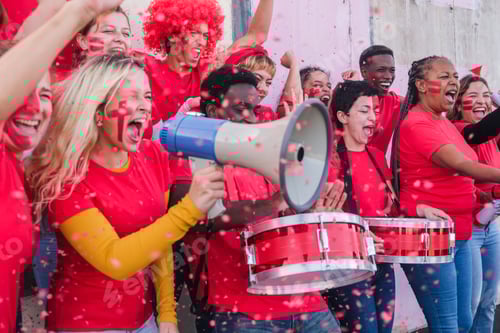 Preview: Enthusiastic Fans Cheering and Playing Drums in Urban Setting