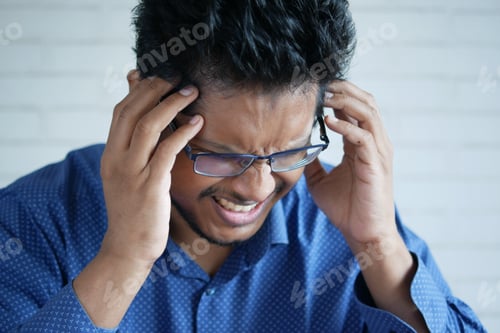 Preview: Depressed man feeling sick and worried about financial problem