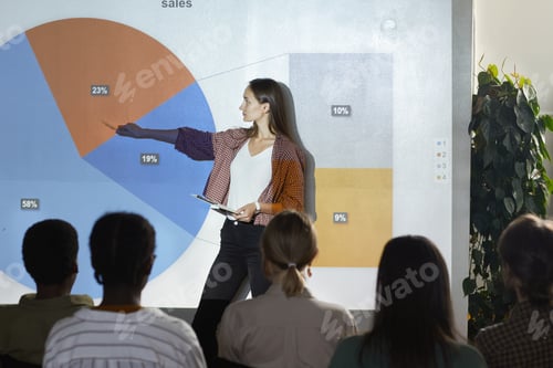 Preview: Young Woman Speaking at Business Conference