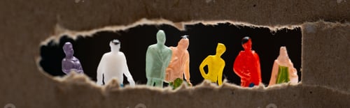 Preview: Panoramic shot of cardboard with hole and people figures isolated on black, concept of social
