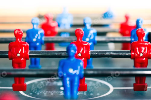 Preview: Table football game sport competition two competitors players on field. Closeup of players