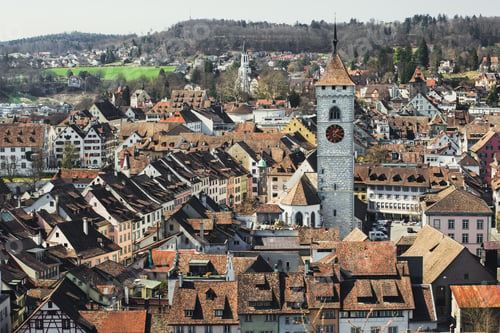 Preview: Top view of a cozy European city with tiled roofs and tower