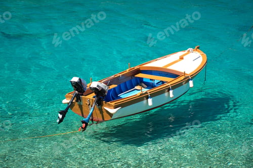 Preview: High angle view of wooden boat on turquoise clear sea
