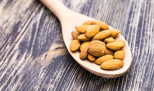 Preview: Almonds in wooden spoon