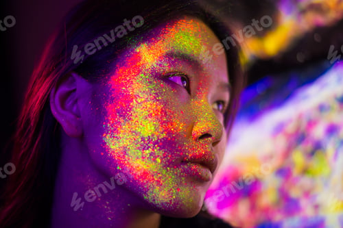 Preview: Fashion model with fluo painting on the face