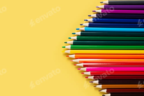 Preview: Group of colorful pencils gradation on yellow background
